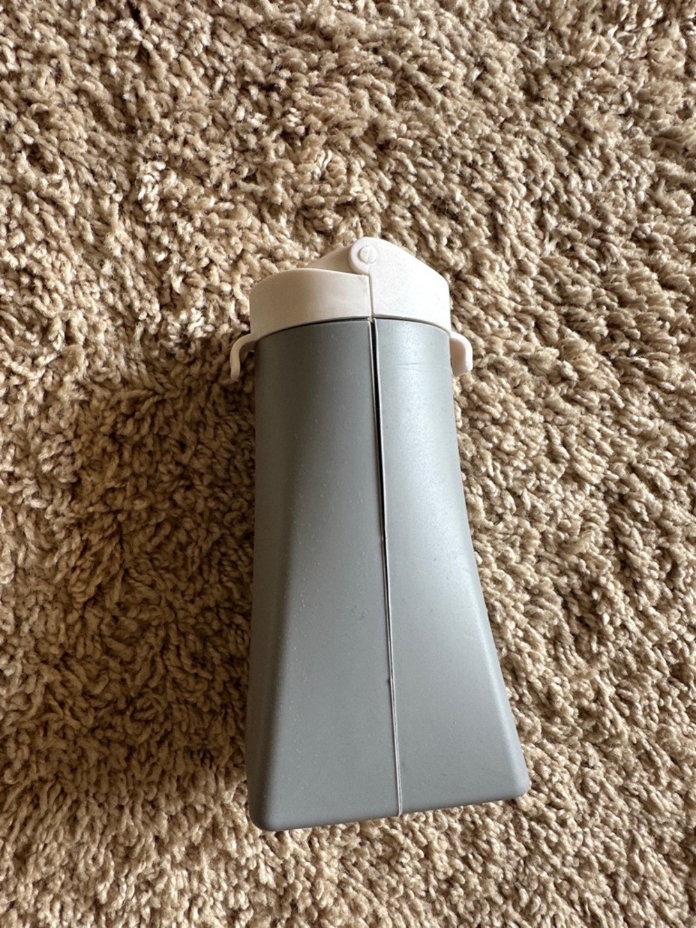 Polder Gray Foldable Hot Hair iron holder with White Clips.